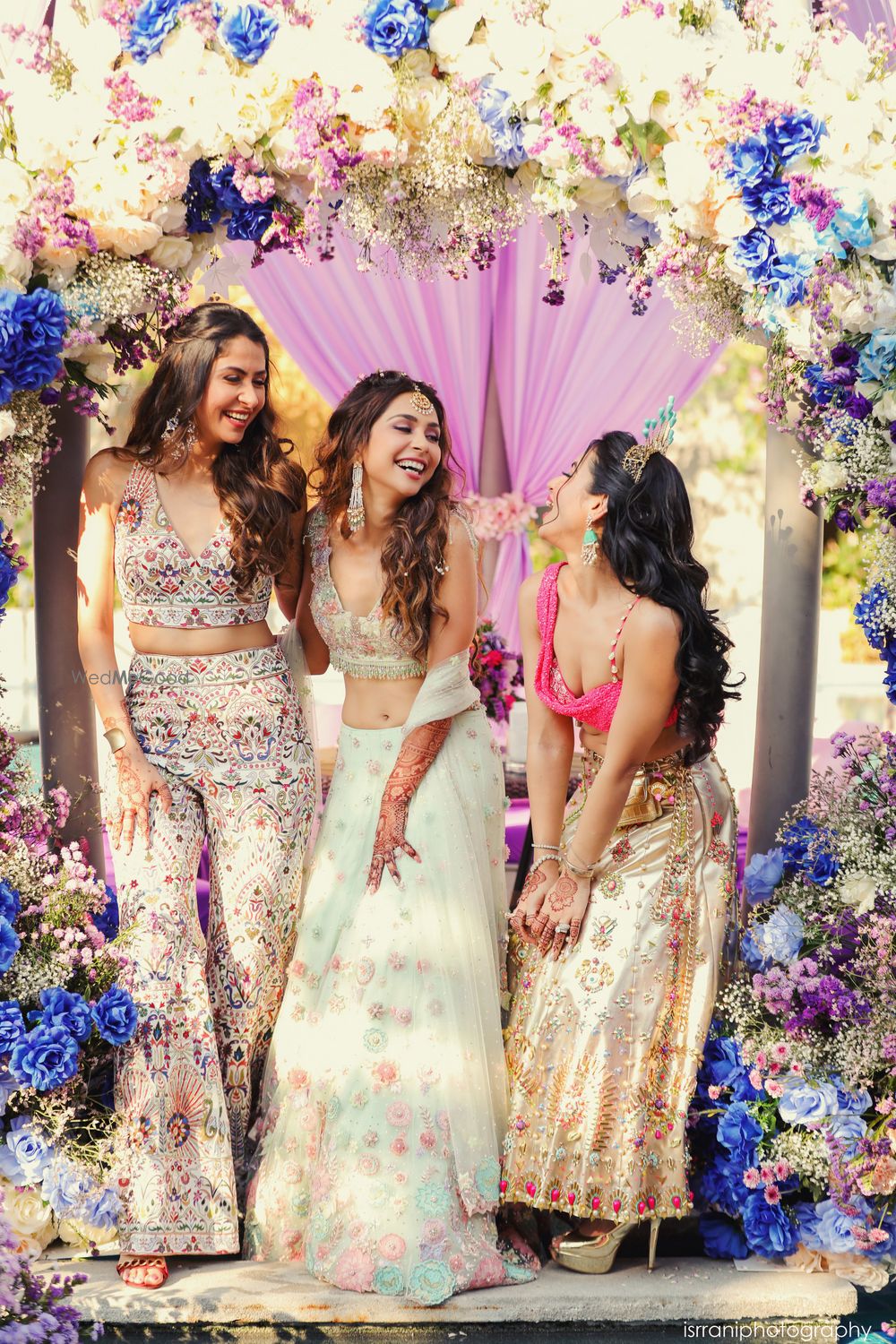 Photo of A fun bride and bridesmaids shot