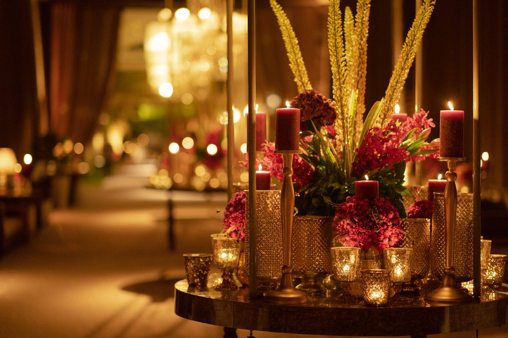 Photo of glam cocktail idea with candles and flowers