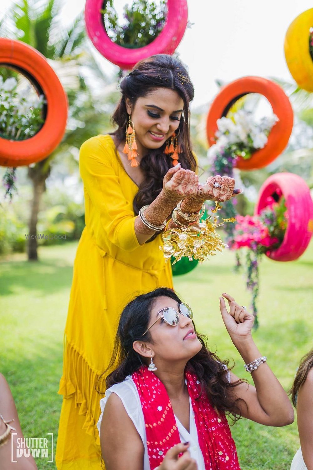 Photo of Kaleere drop shot with bridesmaid