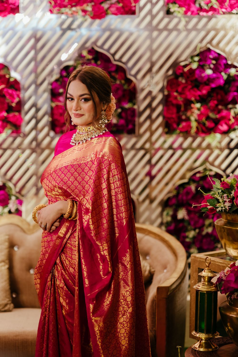 Photo of Bride in a pink and gold silk saree