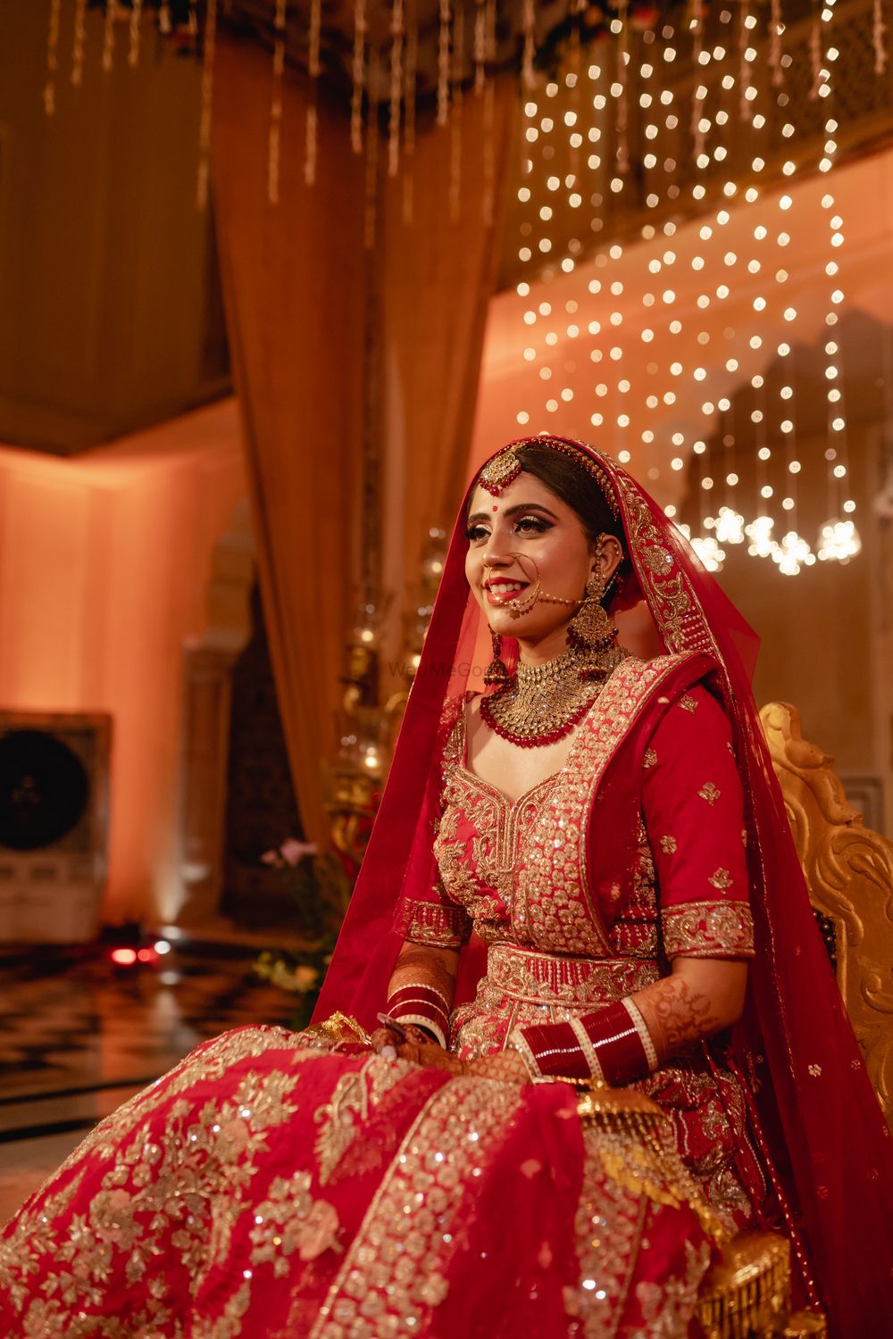 Photo of Bride in a red lehenga