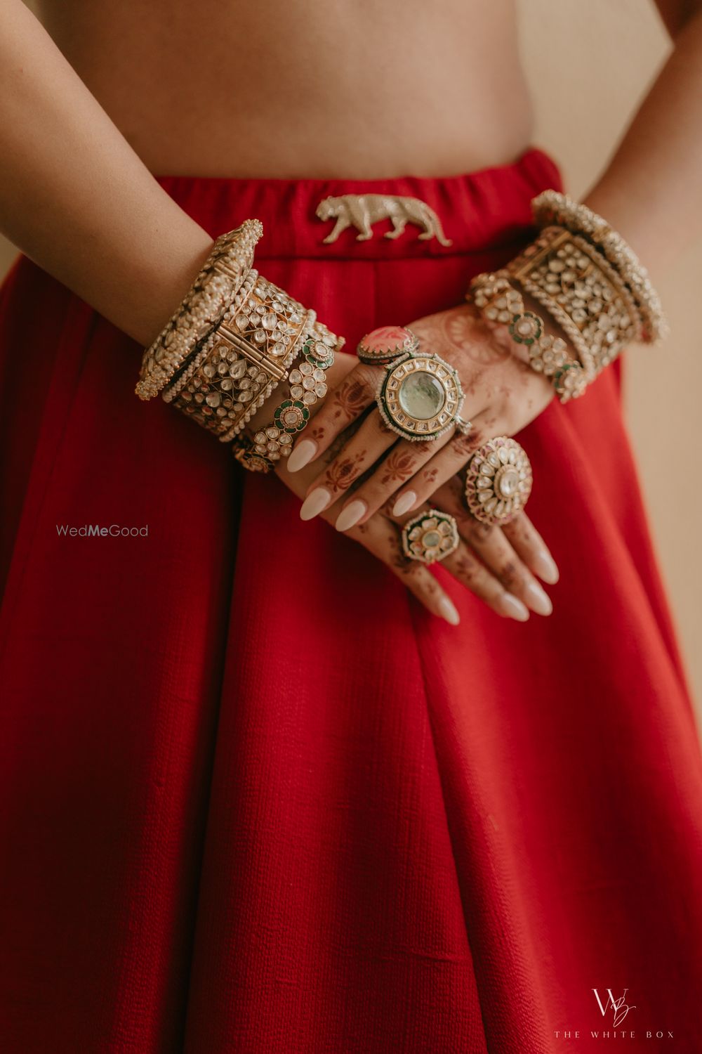 Photo of Stunning bridal bangle stack with statement polki and jadau kadas and rings