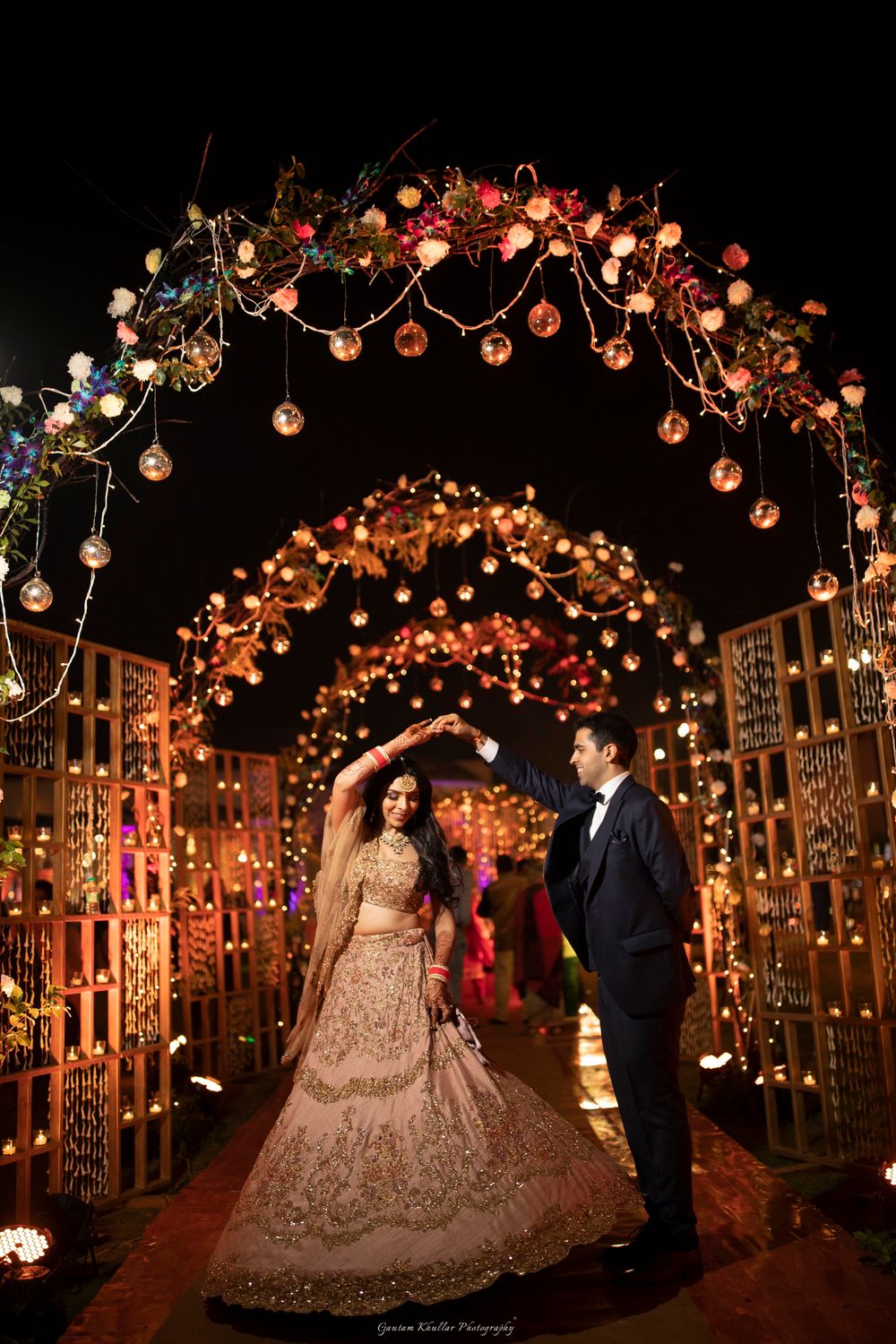 Photo of Sangeet floral decor with dancing couple