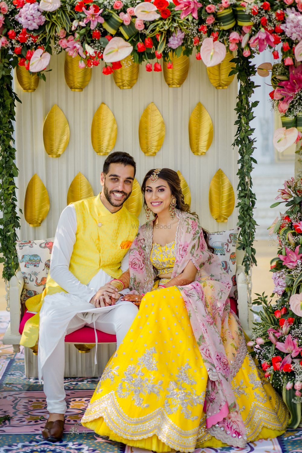 Photo of Bride and groom color-coordinating in yellow.