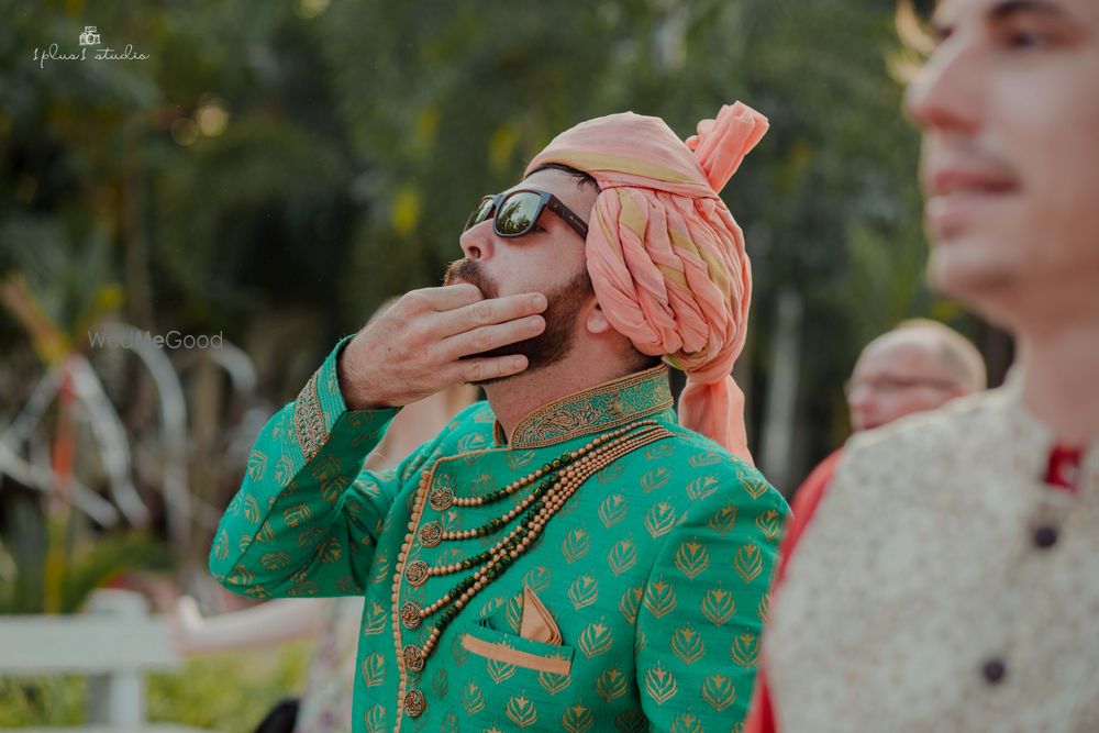 Photo of green sherwani with pastel safa