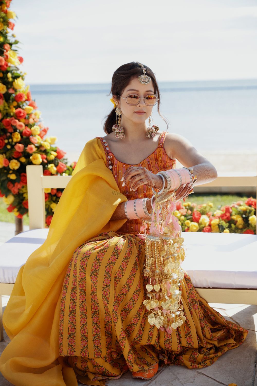 Photo of bride in mustard sharara for her haldi