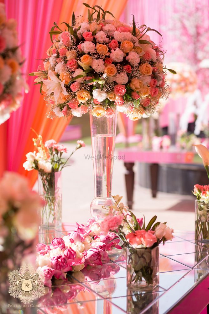 Photo of Pink and peach floral arrangement