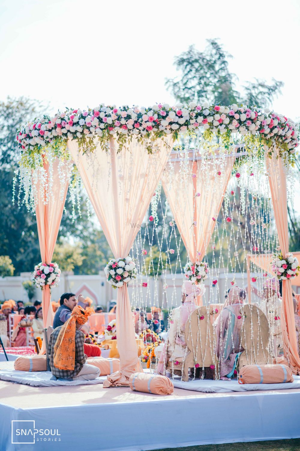Photo of Floral round mandap decor ideas for day wedding.