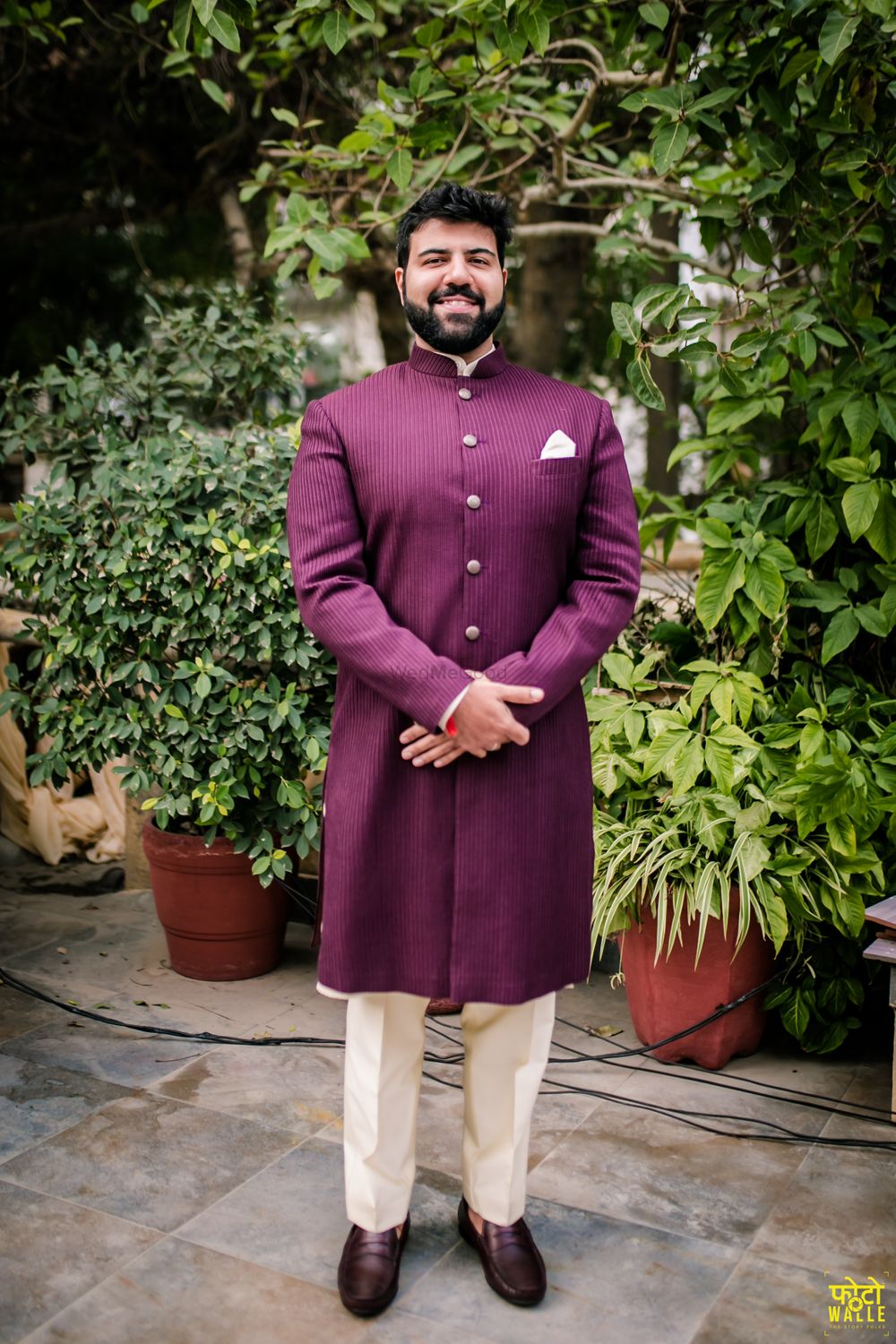 Photo of Groom dressed in purple sherwani