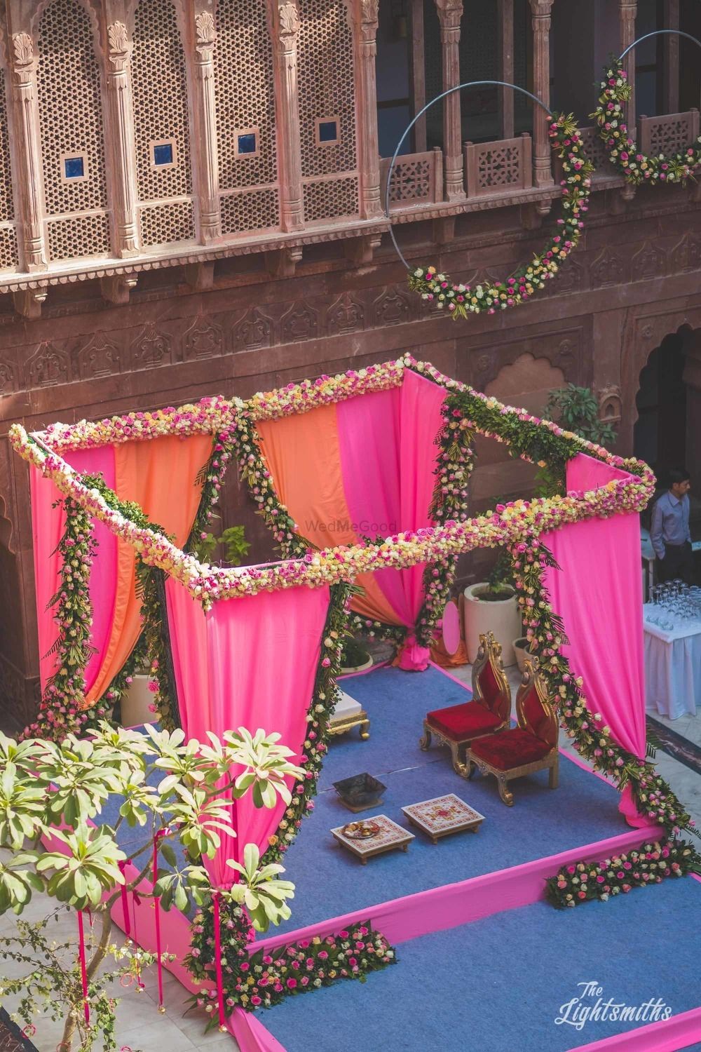 Photo of Unique mandap decor with florals and drapes