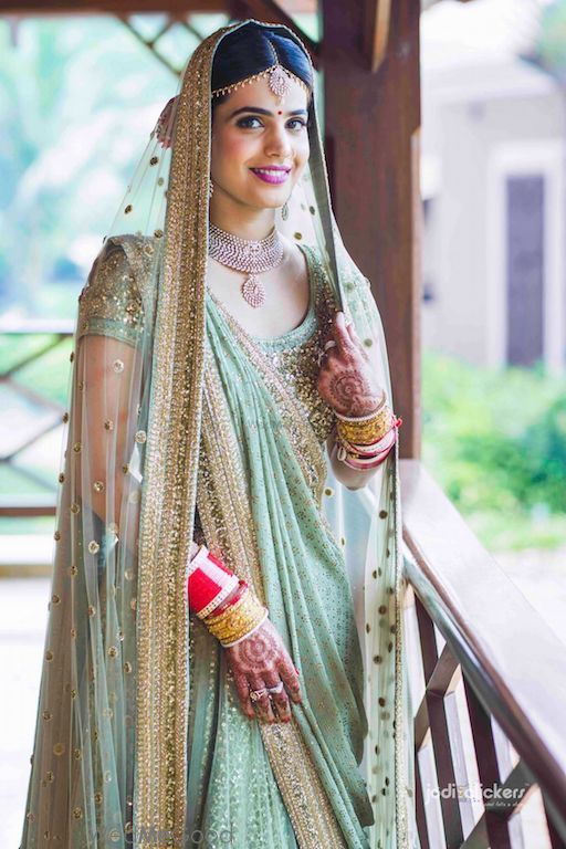 Photo of Offbeat sage green Sabyasachi bride