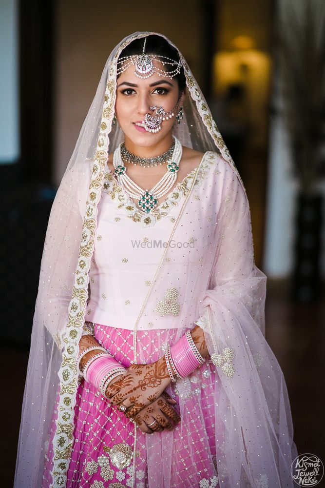 Photo of Sikh bride with simple lehenga and unique bridal jewellery