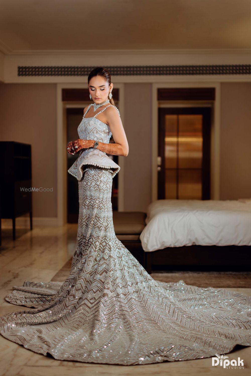 Photo of bride in fishtail cocktail gown