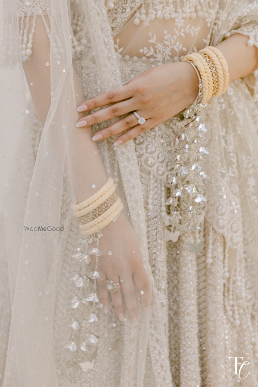 Photo of Unique and gorgeous silver kaleeras with butterfly motifs for the bride on the wedding day