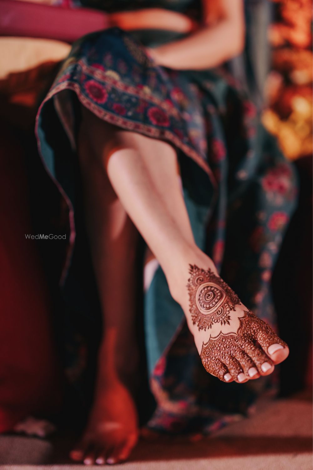 Photo of Lovely shot of a mandala style foot mehendi design for the bride