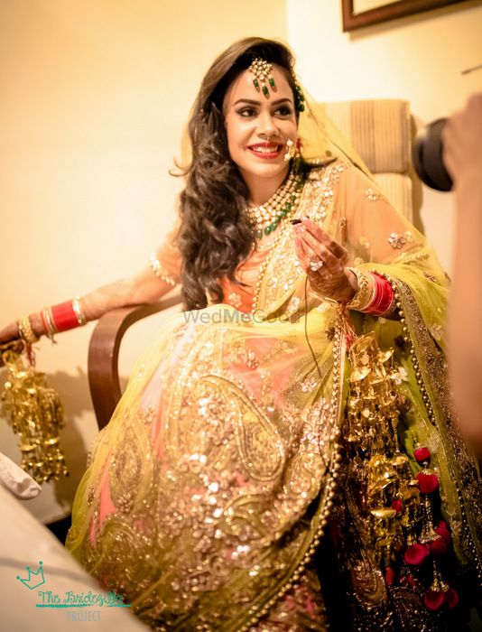 Photo of lime green and coral lehenga