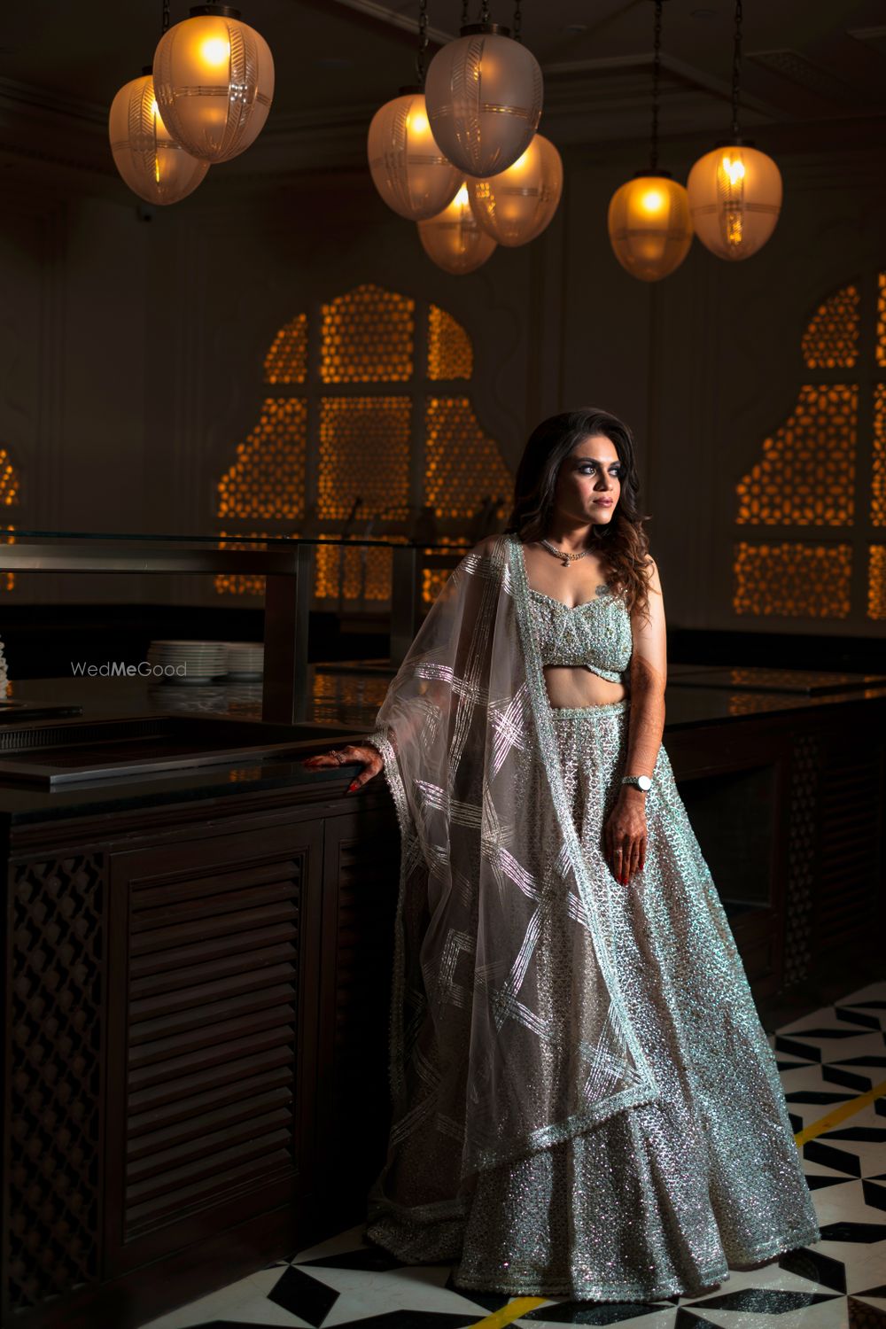 Photo of Bride is a silver lehenga for sangeet