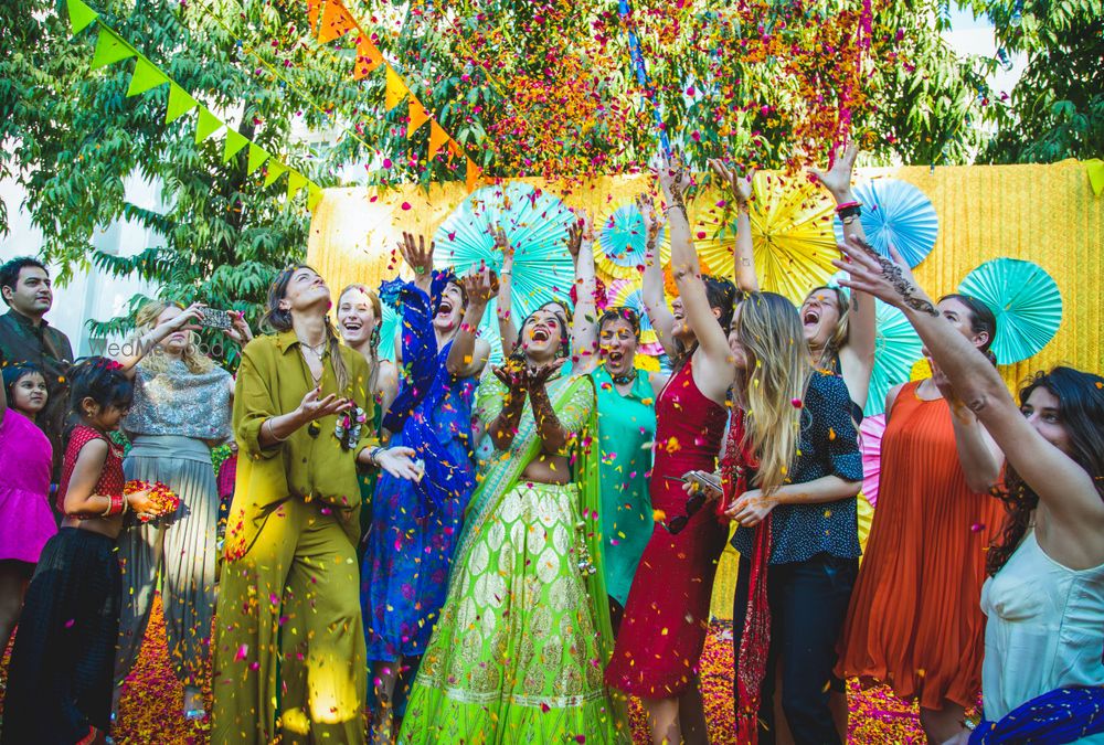 Photo of Flower holi on your mehendi