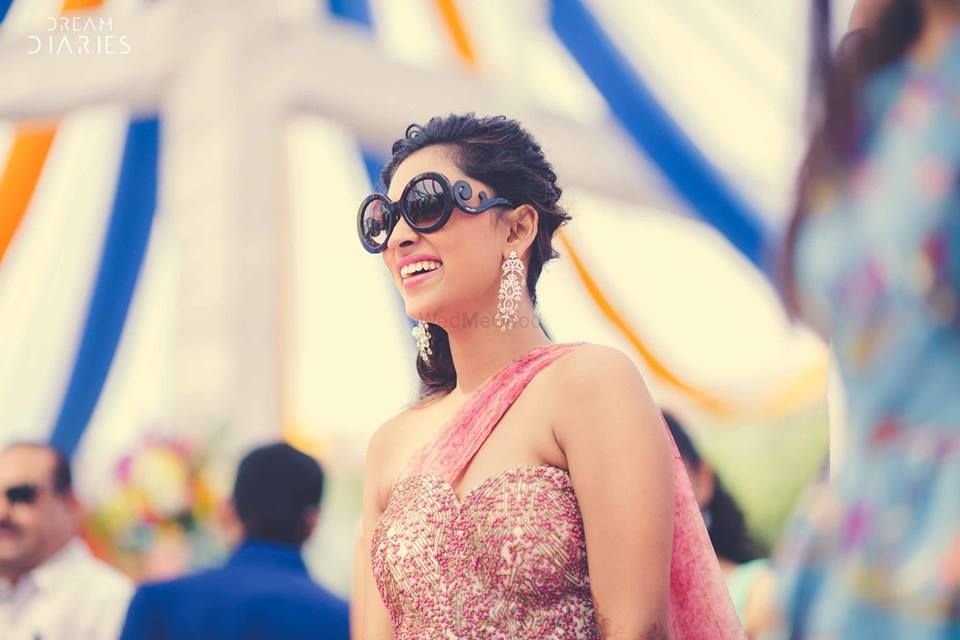 Photo of Bride with sunglasses