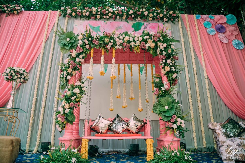 Photo of floral mehendi decor for bridal seat