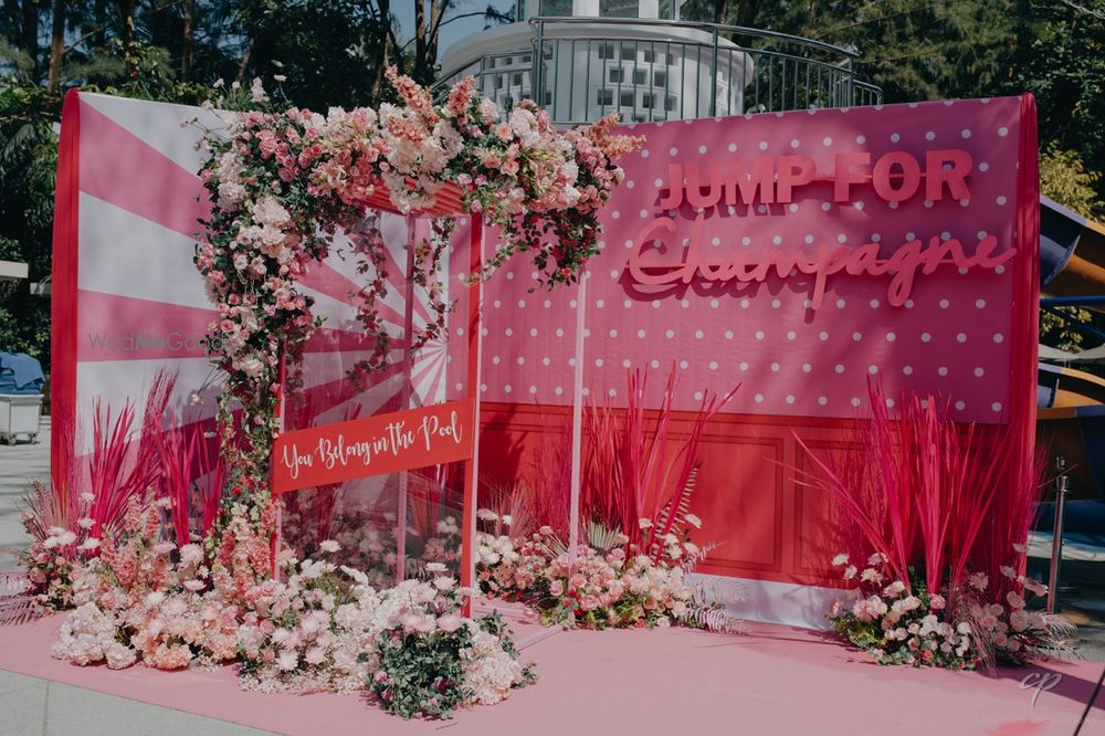 Photo of Super cute champagne themed pink decor element for the mehendi event