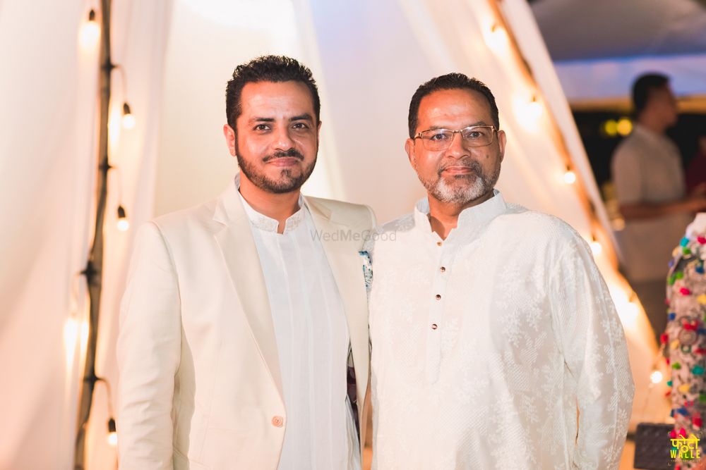 Photo of groom with his father shot