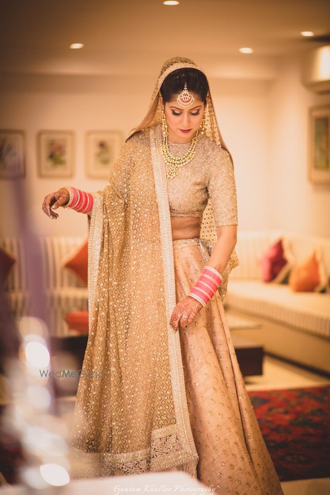 Photo of Offbeat bridal monotone gold lehenga for bride