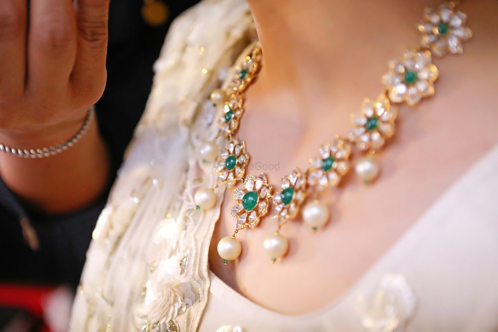Photo of Simple bridal necklace with diamonds and emeralds
