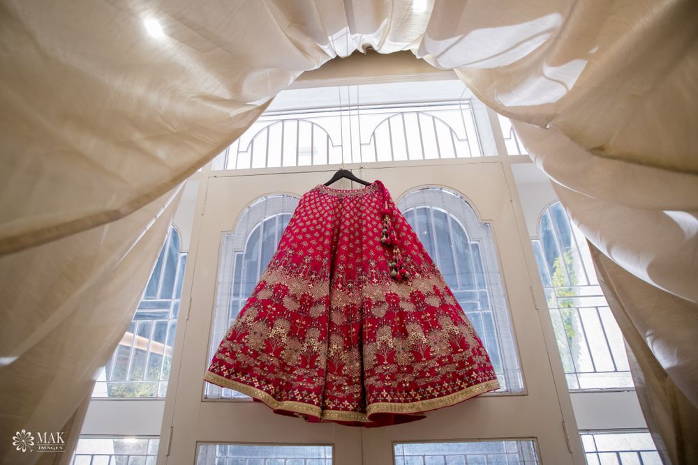 Photo of Bridal lehenga on a hanger.