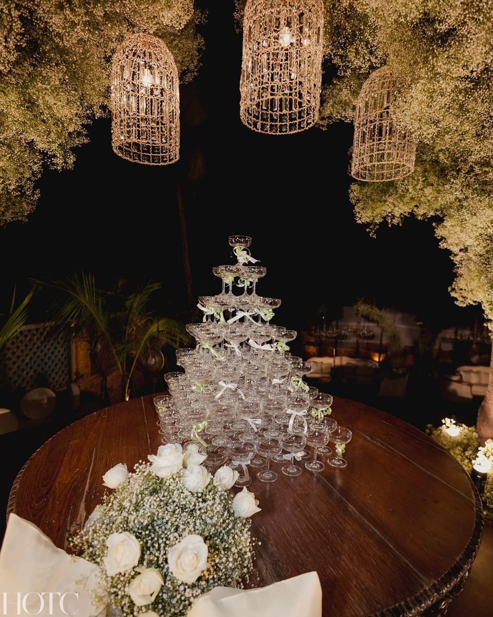 Photo of Gorgeous and unique champagne glass tower setting