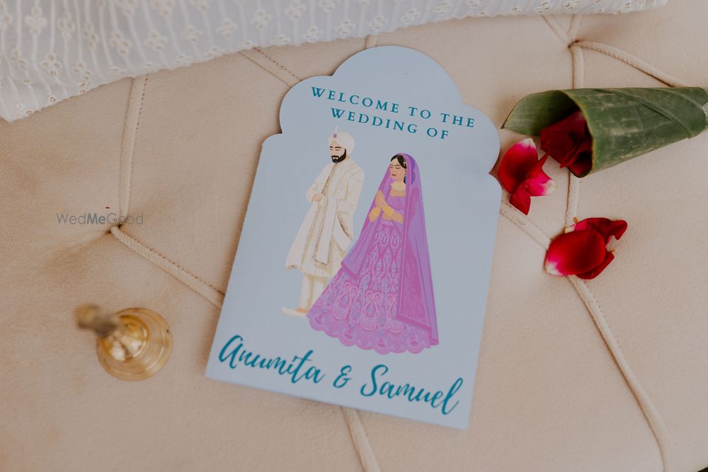 Photo of Cute and personalised note card and bells on the chair on the wedding day