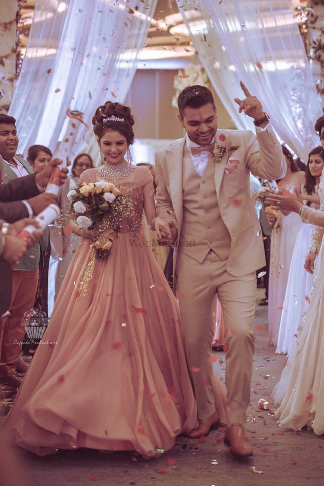 Photo of Bride and groom celebrating after engagement