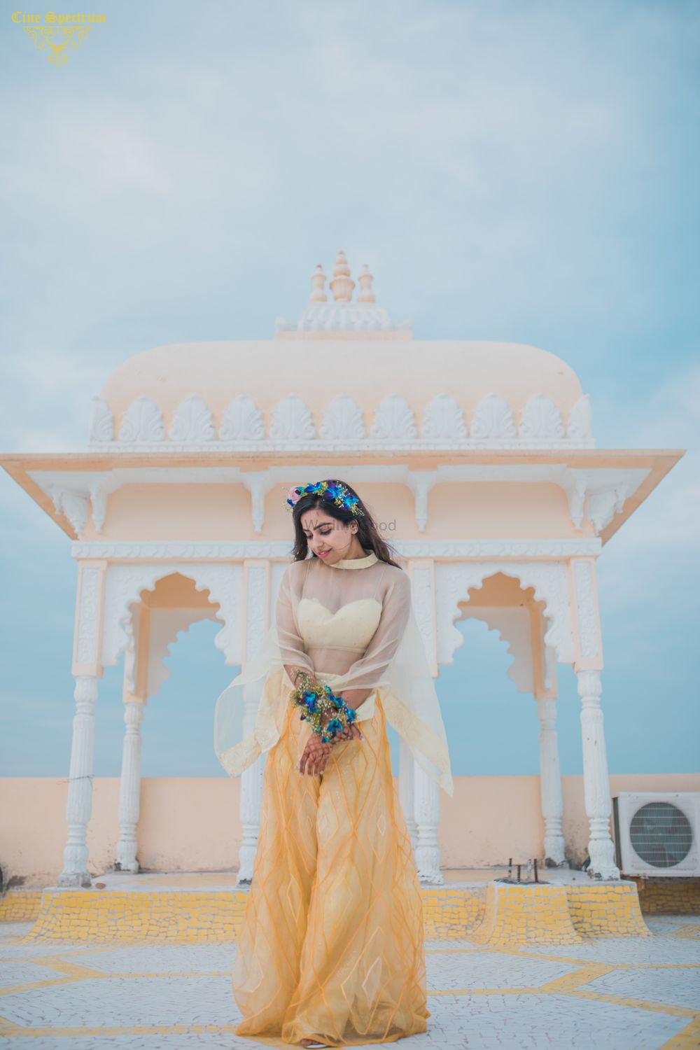Photo of Simple mehendi look in a yellow fusion outfit