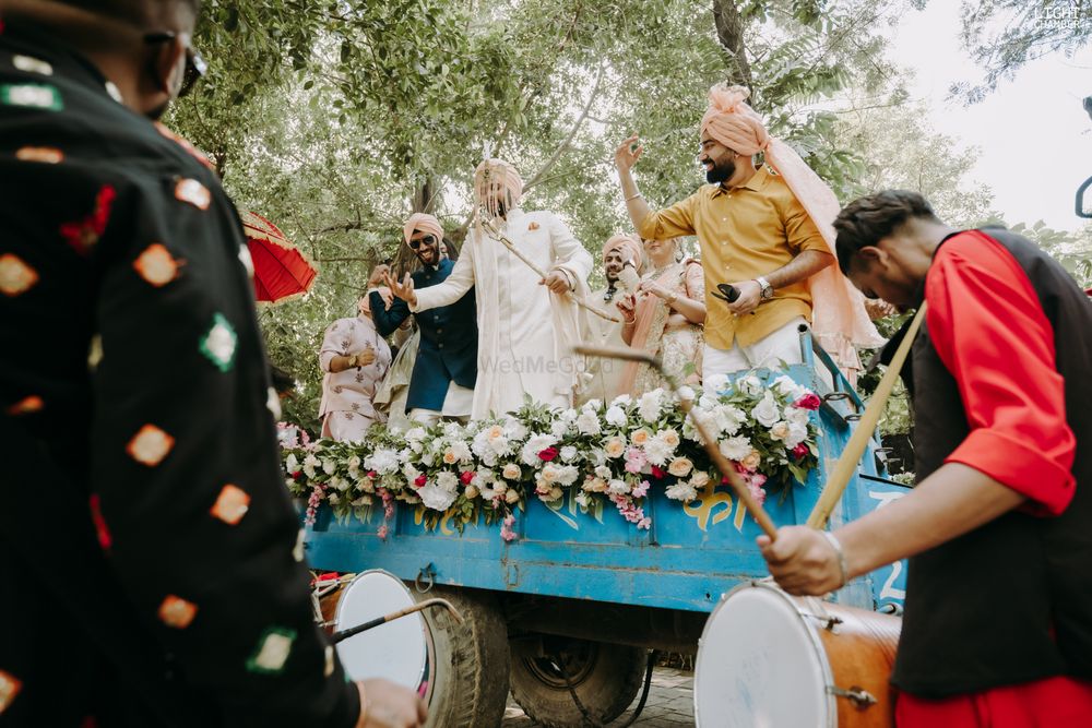 Photo of fun sikh groom entry on truck