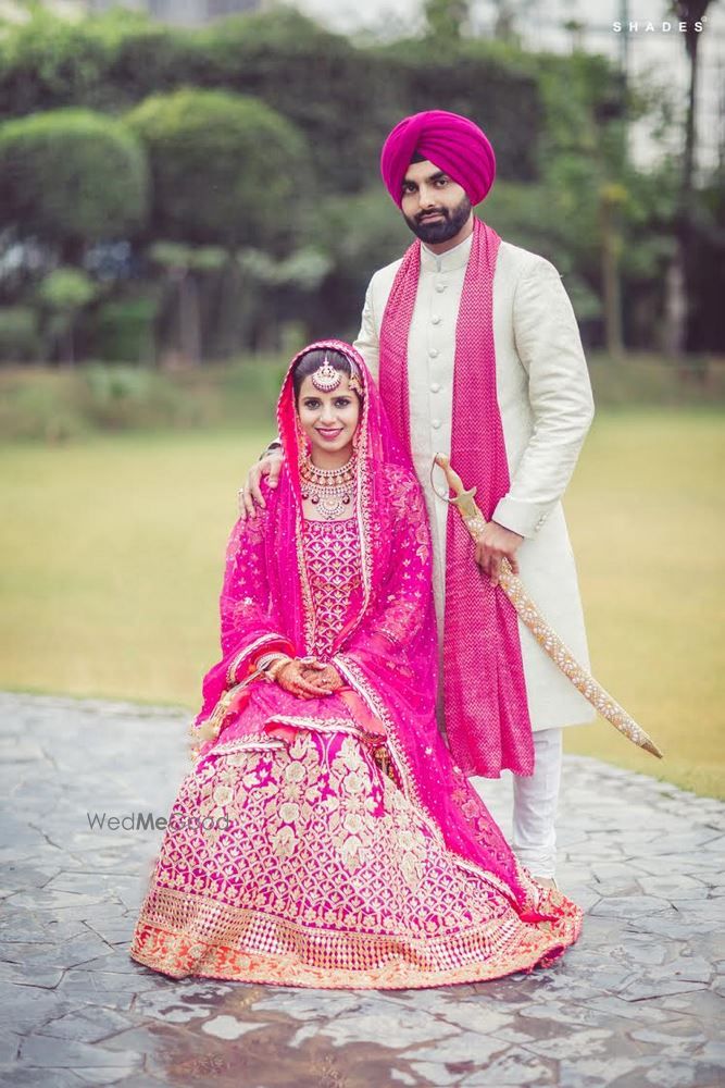 Photo of fuschia pink bridal outfit