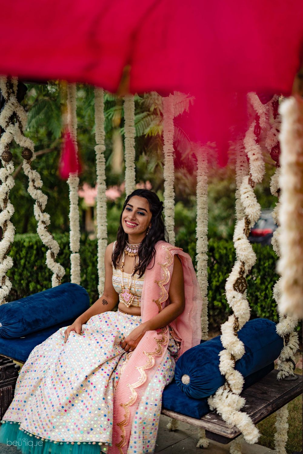 Photo of Bride on mehendi portrait on swing