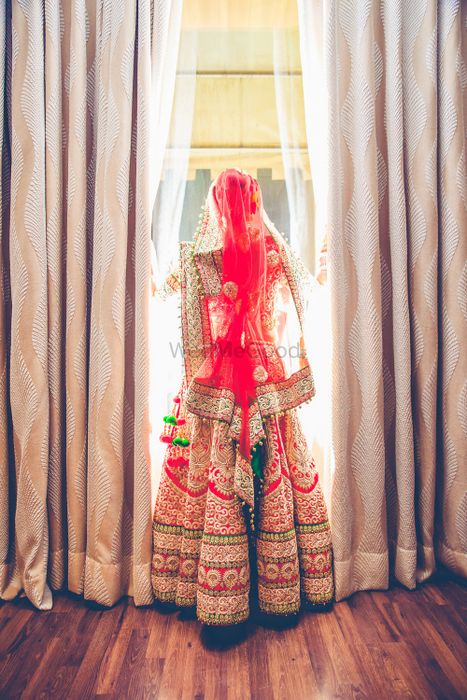 Photo of heavy red bridal lehenga