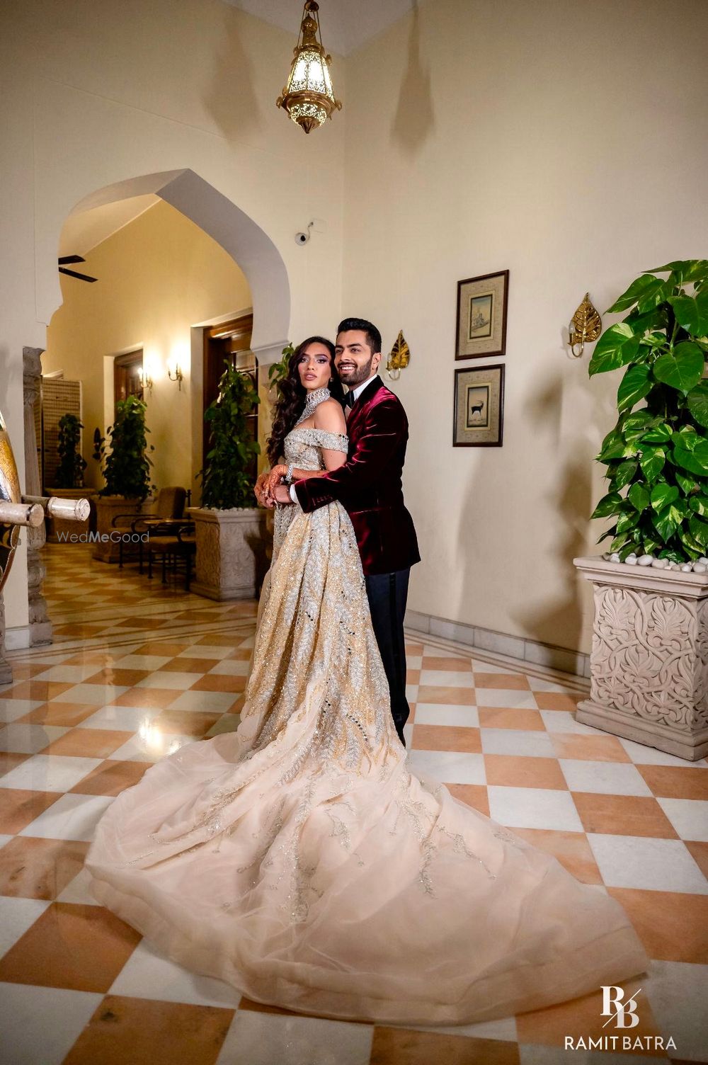 Photo of couple on cocktail nigh in gown