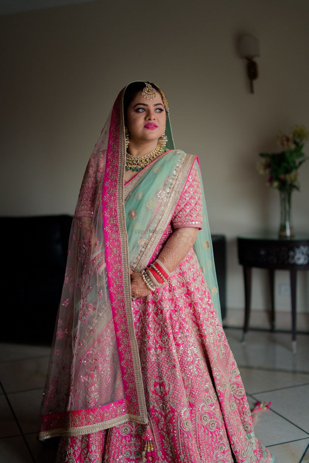 Photo of Punjabi bride in pretty pink lehenga for wedding