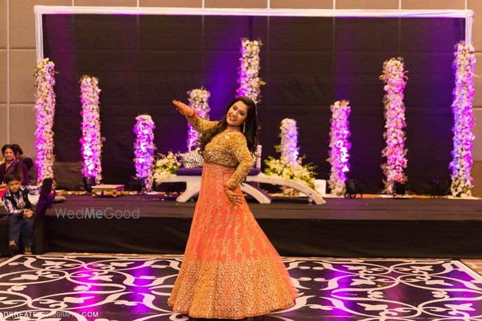 Photo of coral and gold anarkali layered gown