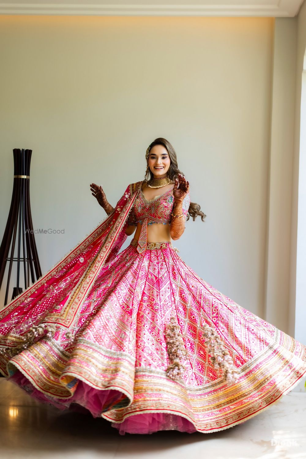 Photo of twirling bride shot