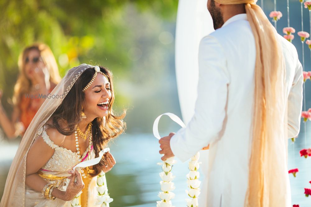 Photo of Bright and happy couple jaimala shot