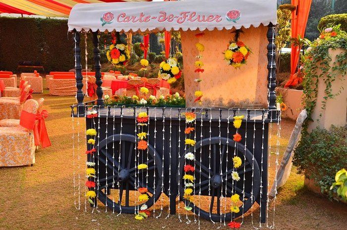 Photo of Have a flower cart that people can use to take flowers to throw on you and to pin on their hair