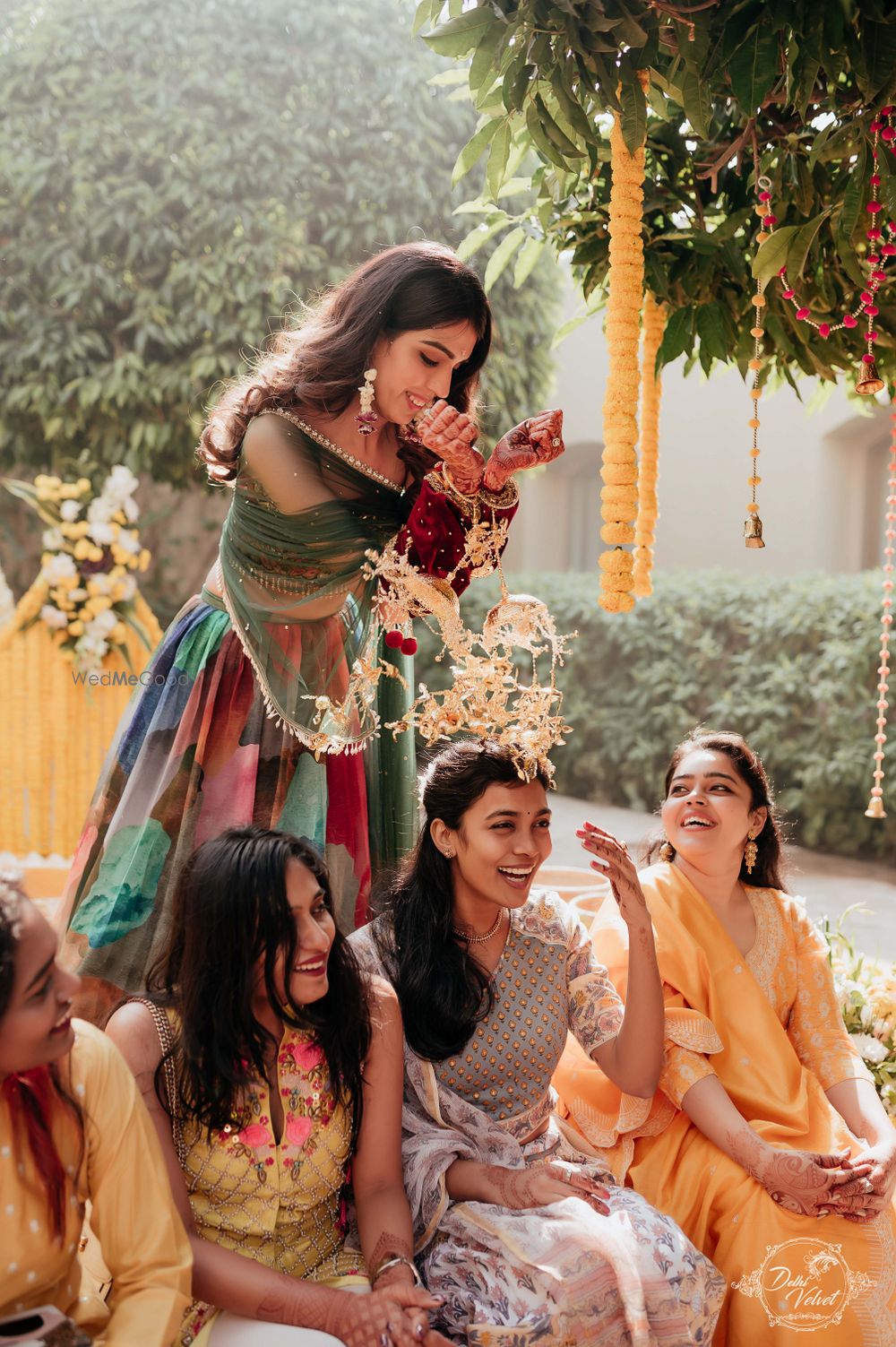 Photo of bridal kaleere drop shot with bridesmaids