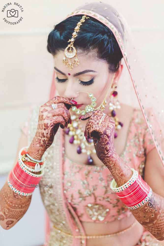 Photo of Bride adjusting nosering