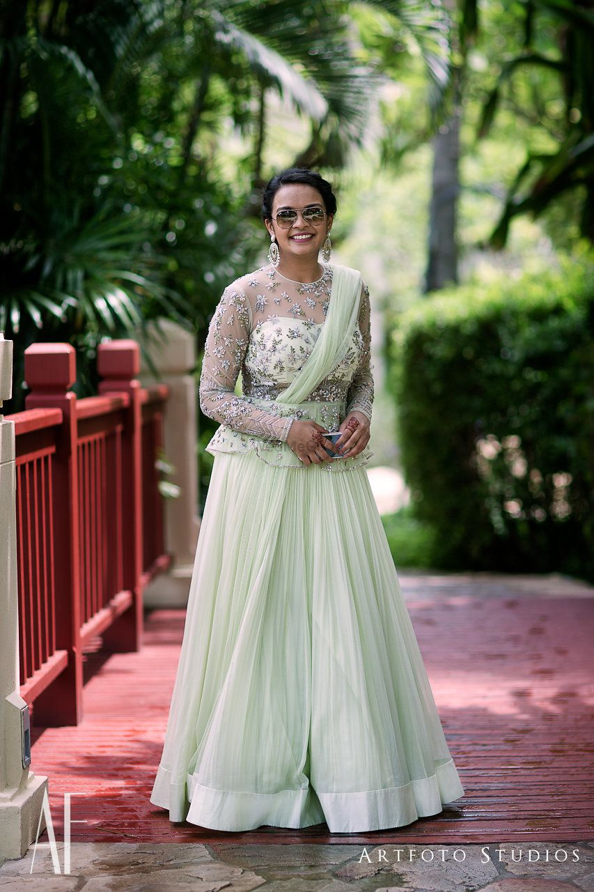 Photo of Light green lehenga with unique blouse for sister of the bride
