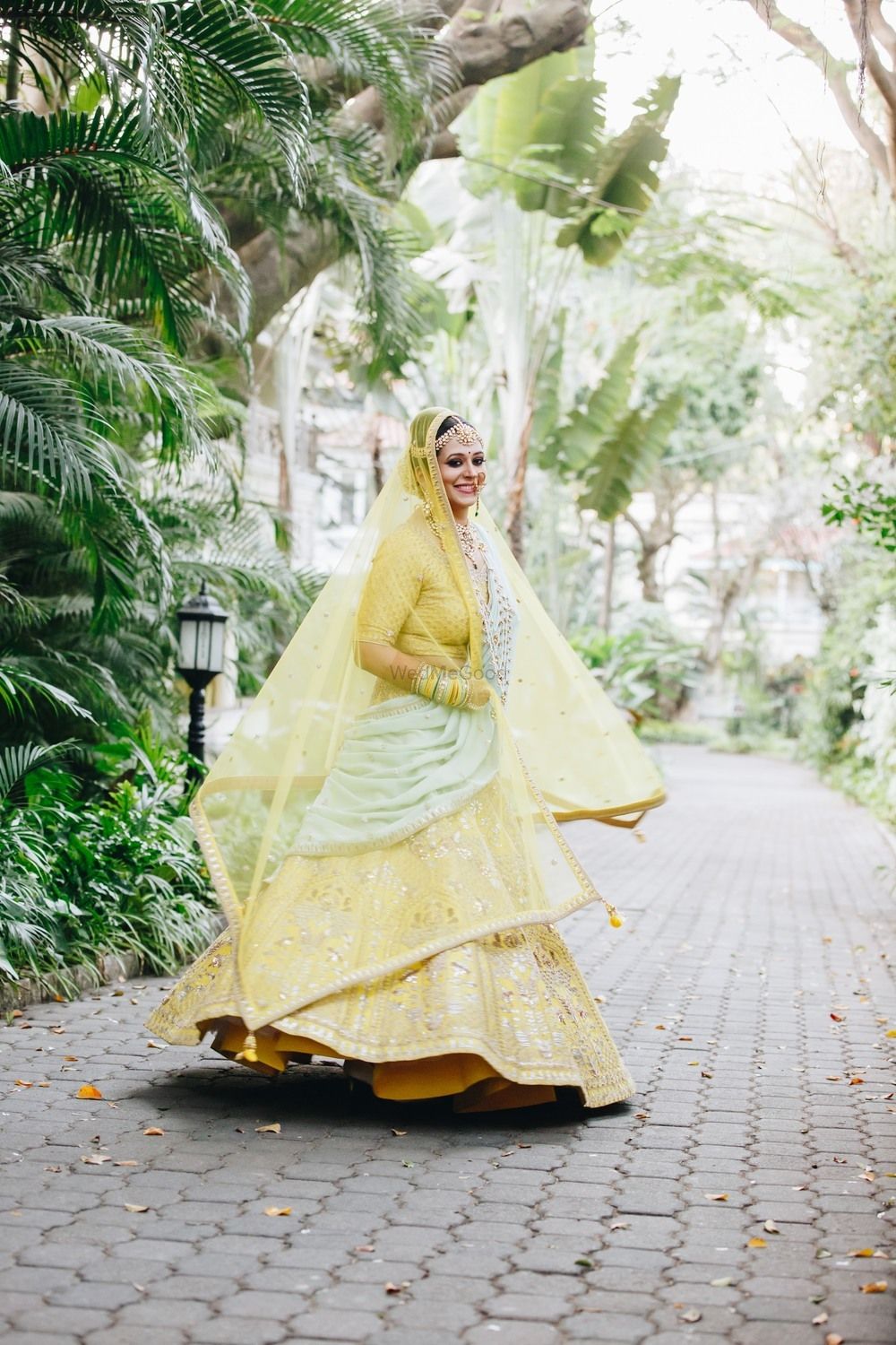 Photo of Unique bridal lehenga in yellow and mint