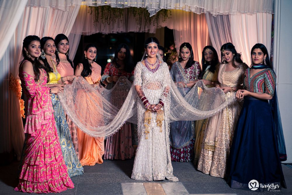 Photo of bride entering with the bridesmaids
