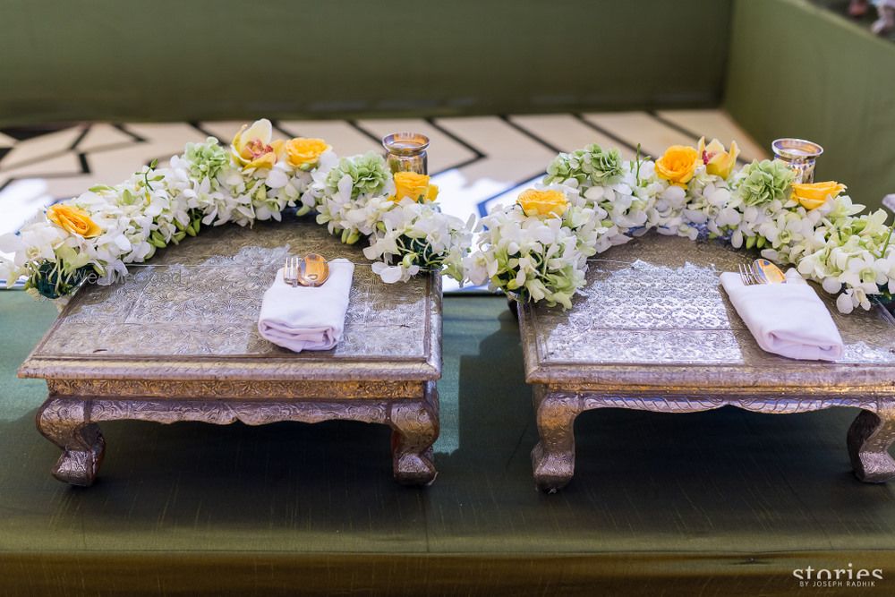 Photo of Food serving ideas with marigold flowers at Indian wedd