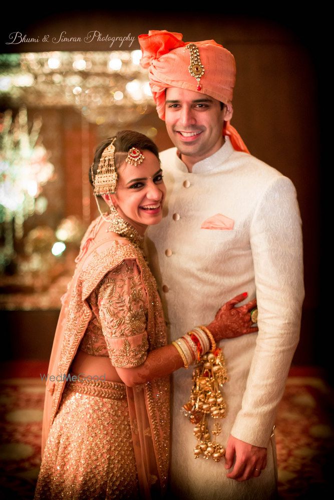 Photo of Peach and gold bridal lehenga